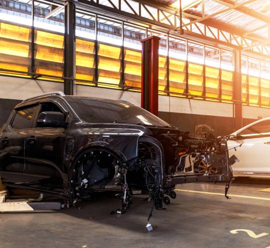 Car,Repair,In,Garage,Service,Station,With,Soft-focus,And,Over